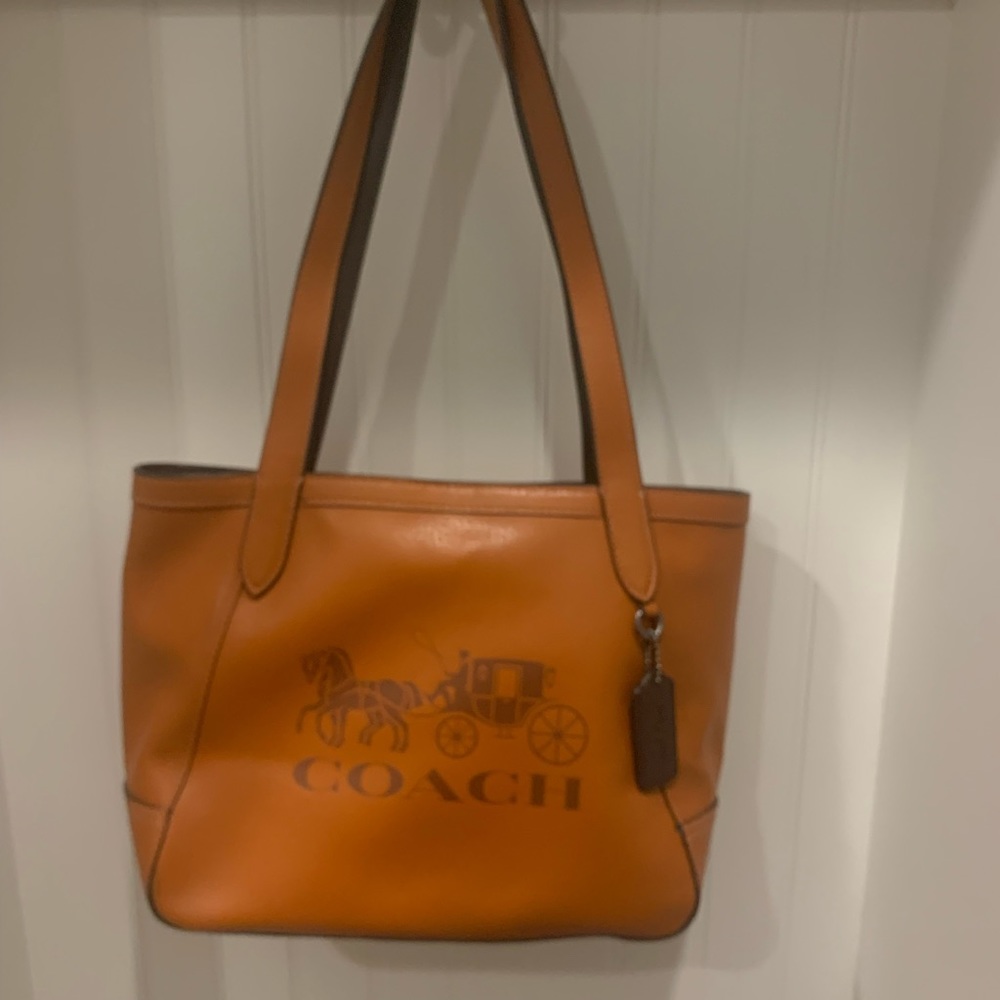 Coach horse and carriage 27 tote.  Brown